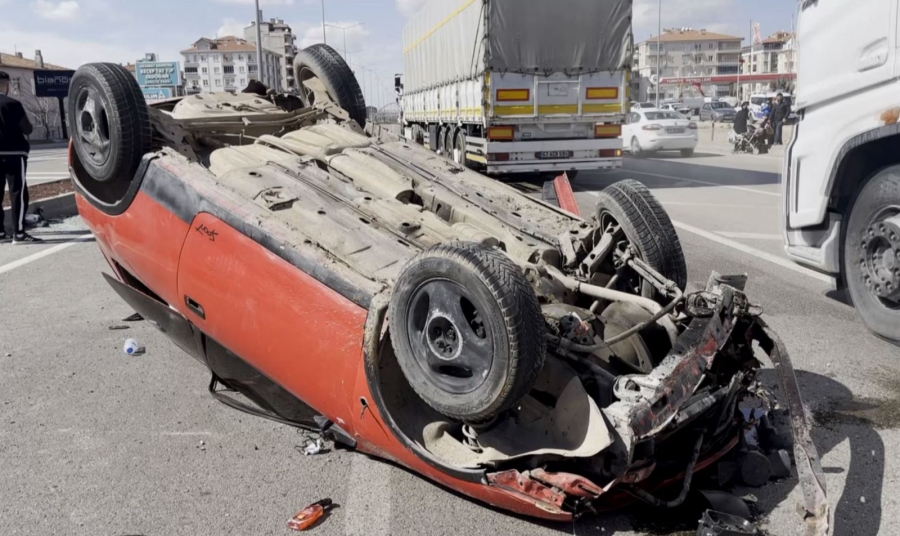 Takla atan otomobilden burnu bile kanamadan kurtuldu
