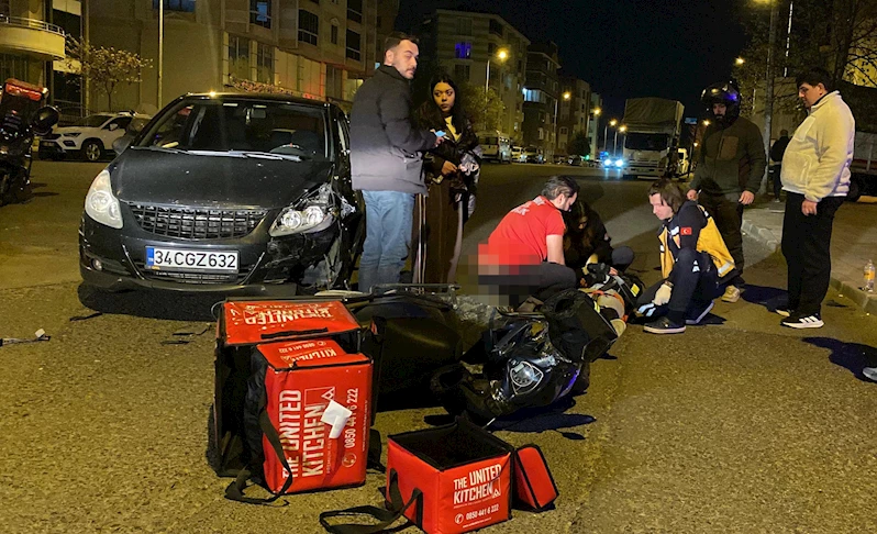 Otomobille çarpışan motosikletin sürücüsü kurye yaralandı